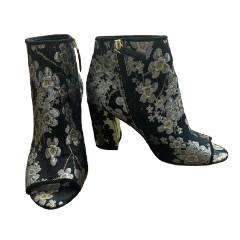 Nine West open toe heeled bootie.